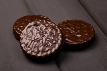 Chocolate chip cookies on a wooden background