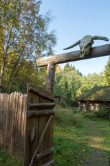 Gate to the viking village with decorative skull