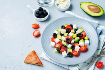 Avocado tomato black olives feta cheese salad