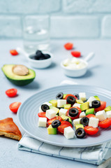 Avocado tomato black olives feta cheese salad