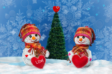 Love snowmen. Snowfall. Love concept. Valentine's Day Greeting card