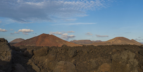 Los Hervideros, coastline in Lanzarote with waves and volcano. Canary islands, Spain 