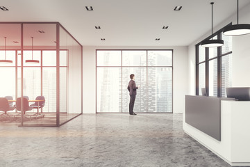 Fototapeta premium White office, reception desk toned
