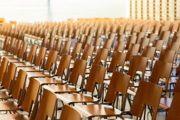 Fototapeta premium Rows of chairs in the school hall