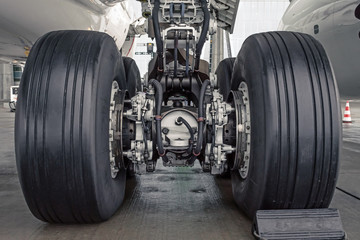 Obraz na płótnie Canvas Wheels rubber tire rear landing gear racks.