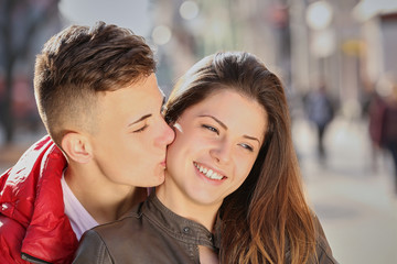 young couple, kiss for my girl in spring