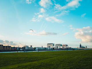 Cologne cityscape with Cologne Cathedral, Rheinauhafen and Crane Houses