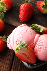 Strawberry ice cream scoop, scooped with a ice spoon