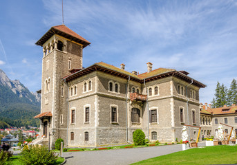 Fototapeta na wymiar Cantacuzino Castle in the Busteni Mountains built in neo romanian architectural style on a sunny summer day
