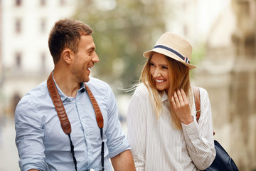 Obraz premium Travel. Tourist Couple Traveling, Walking On Street
