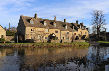 Naklejka na ściany i meble LOWER SLAUGHTER, UK - Picturesque Scene of Cottages in Lower Slaughter, Cotswolds, England