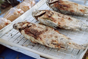 Obraz na płótnie Canvas Fish grilled salt at street food