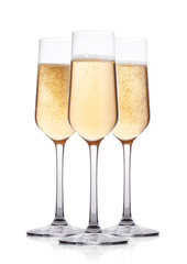 Elegant glasses of yellow champagne with bubbles