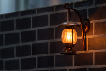 Modern wall lamp on the brick wall interior decoration