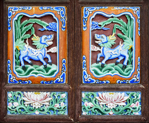 Traditional Chinese door in a pavilion of Dali Old Town. Located in Dali, Yunnan, China.