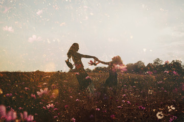 Girls in the field of flowers, double exposure