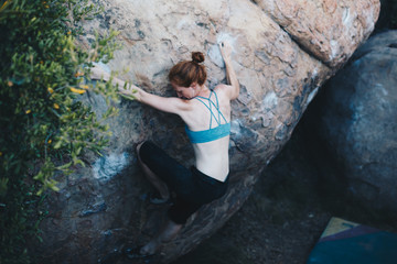 Redhead Climber Bouldering Outside