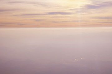 Blue sky background with Dark gray clouds at sunset.