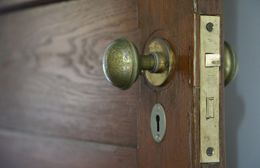 Old wooden door and knob of the room