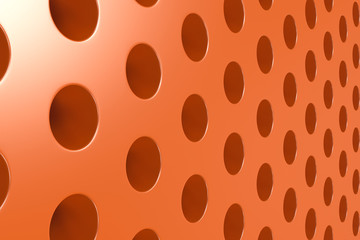 Plain orange surface with cylindrical holes