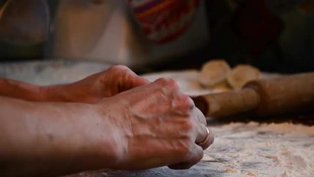 Woman Sculpts Dumplings at Home Kitchen
