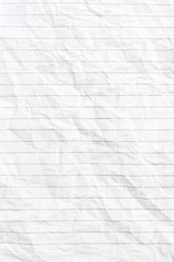Texture of crumpled notepad sheet. Top view.