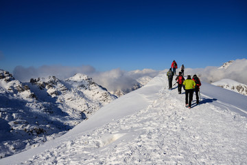 Fototapeta na wymiar alpinisti sulla cima di Piazzo - alpi Orobie