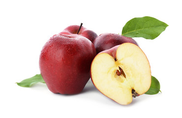Ripe red apples on white background