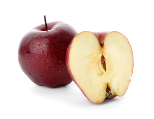 Ripe red apples on white background