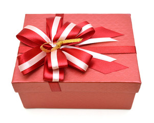 red gift box with ribbon bow isolated on white