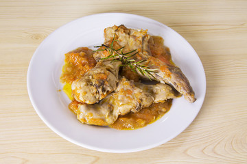 meat. dish with rabbit stew and rosemary