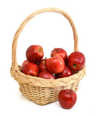 red apples in basket on white