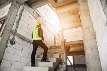 Fototapeta premium professional engineer worker at the house building construction site