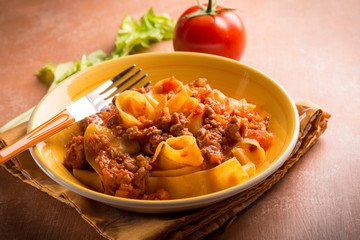pasta with sausage ragout,selective focus
