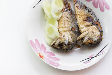 Fried or grilled mackerel fish white background Thai food