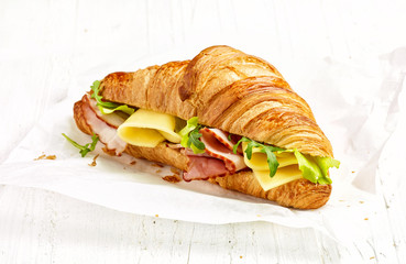 croissant sandwich with ham and cheese