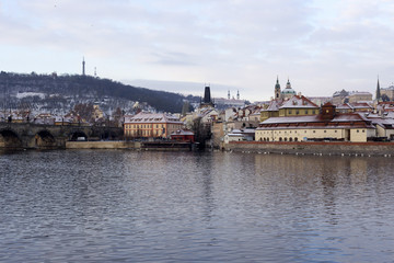 Snowy Prague Lesser Town with St. Nicholas' Cathedral, Czech republic