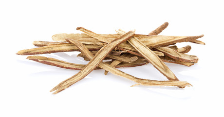 dried organic licorice root isolated on white