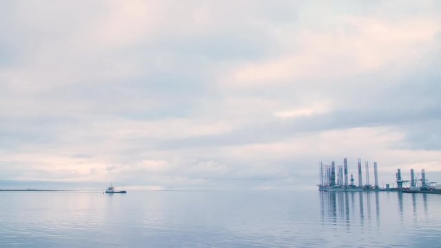 Ship sailing in habour with island