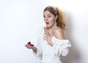 attractive surprised girl receive engagement ring