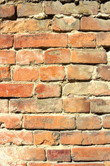 Vertical background of old vintage red brick wall