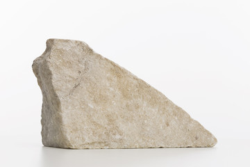 Triangle shaped marble rock on white background, minimalist decoration for workspace