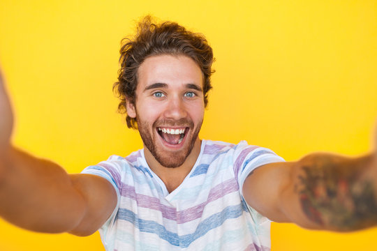 Excited Man Taking Selfie