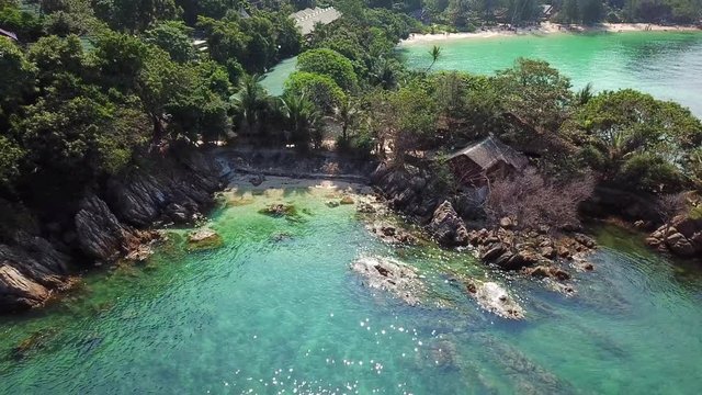 Drone flying above koh Raham area, Haad Son sand beach and Secret beach at koh Phangan island,Thailand