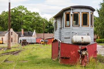 old small locomotive designed to clean up the snow from rails in winter; a wagon with plough