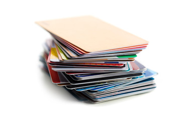 Stack of credit cards on white background