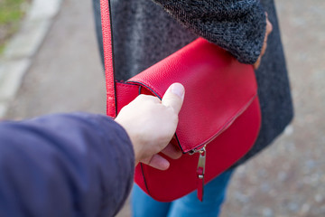 Close up pickpocketing outdoor