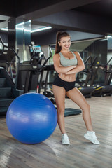 Sporty woman at fitball