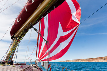 Red sail and blue sky