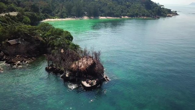 Drone flying above koh Raham area, Haad Son sand beach and Secret beach at koh Phangan island,Thailand